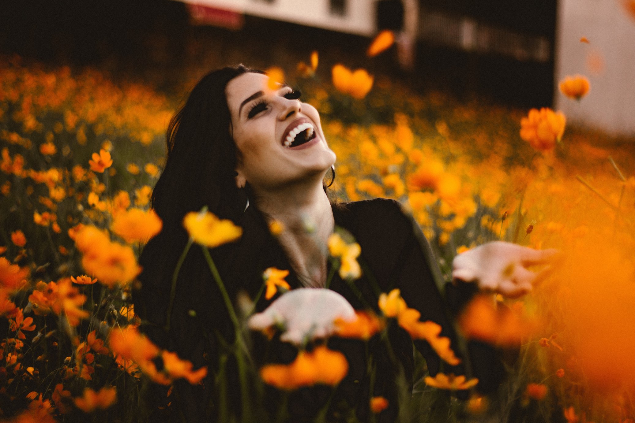 Happy Woman in the Flower Field